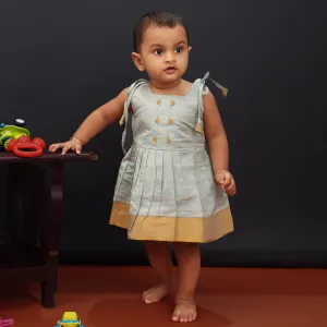 Aqua Elegance: Ethnic Silk Frock with Cute Tassels