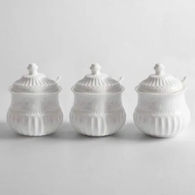 Elegant Butterfly Ceramic Spice Jar Set with Embossed Designs, Measuring Spoons, and Secure Lids for Chic Kitchen Storage